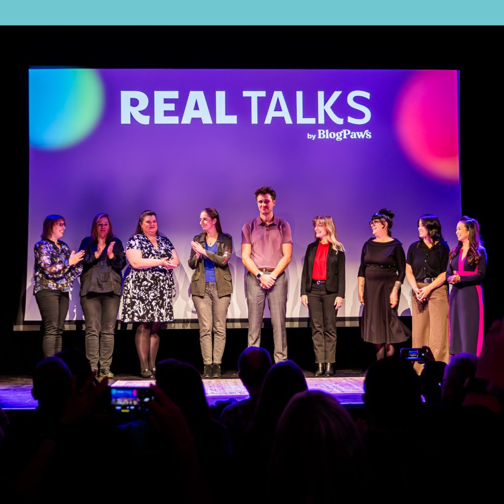 Speakers on stage at REAL Talks by BlogPaws