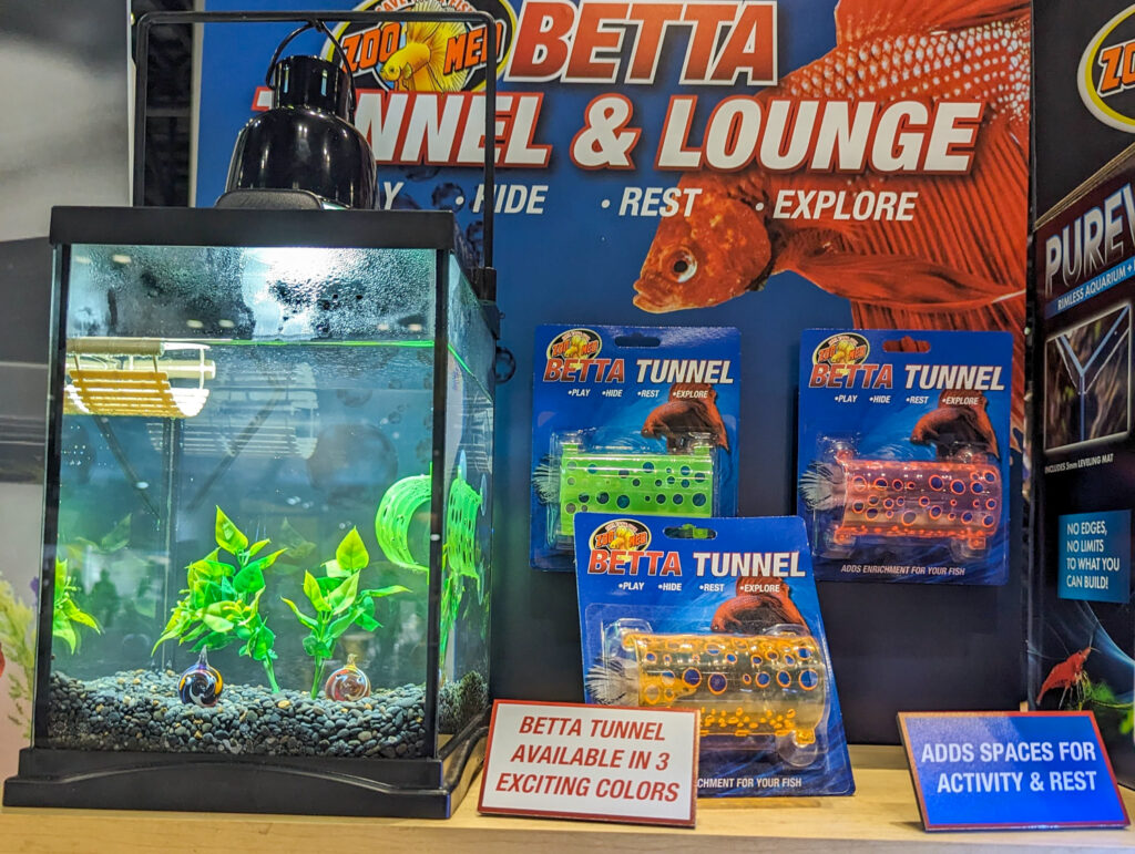 Aquarium with the Betta Tunnel in green and Floating Lounge that looks like a wooden bridge