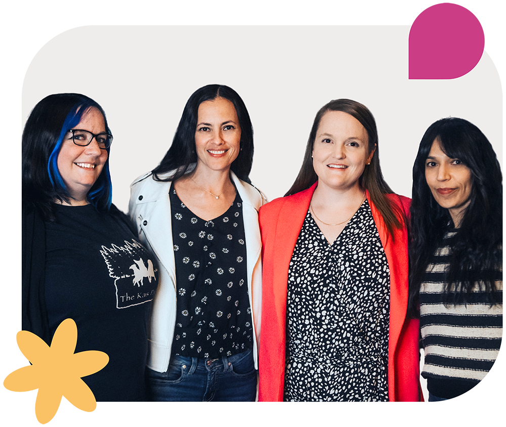 Four women posed together
